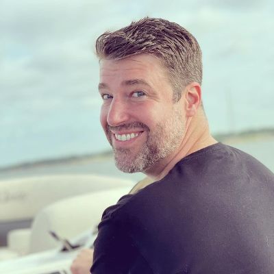 Jessica Evans's husband Michael Evans posing for a photo shoot.